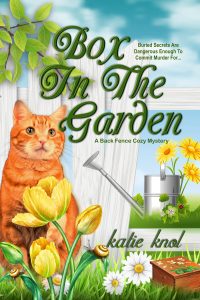 Ginger cat on book cover for Box in the Garden, first in the Back Fence cozy mystery series